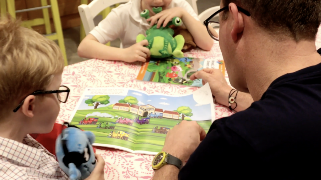 Reading at home using Monster Phonics books with parents